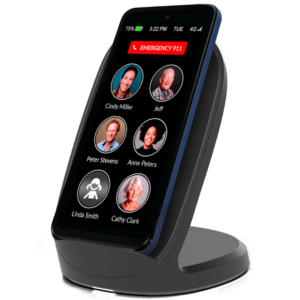 A RAZ Memory Cell Phone placed on a wireless stand charger, displaying emergency contacts on its screen.